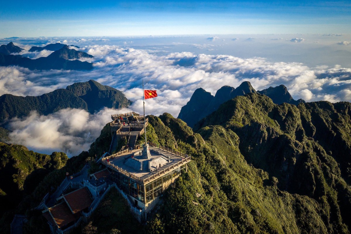 Fansipan summit rising above a sea of clouds
