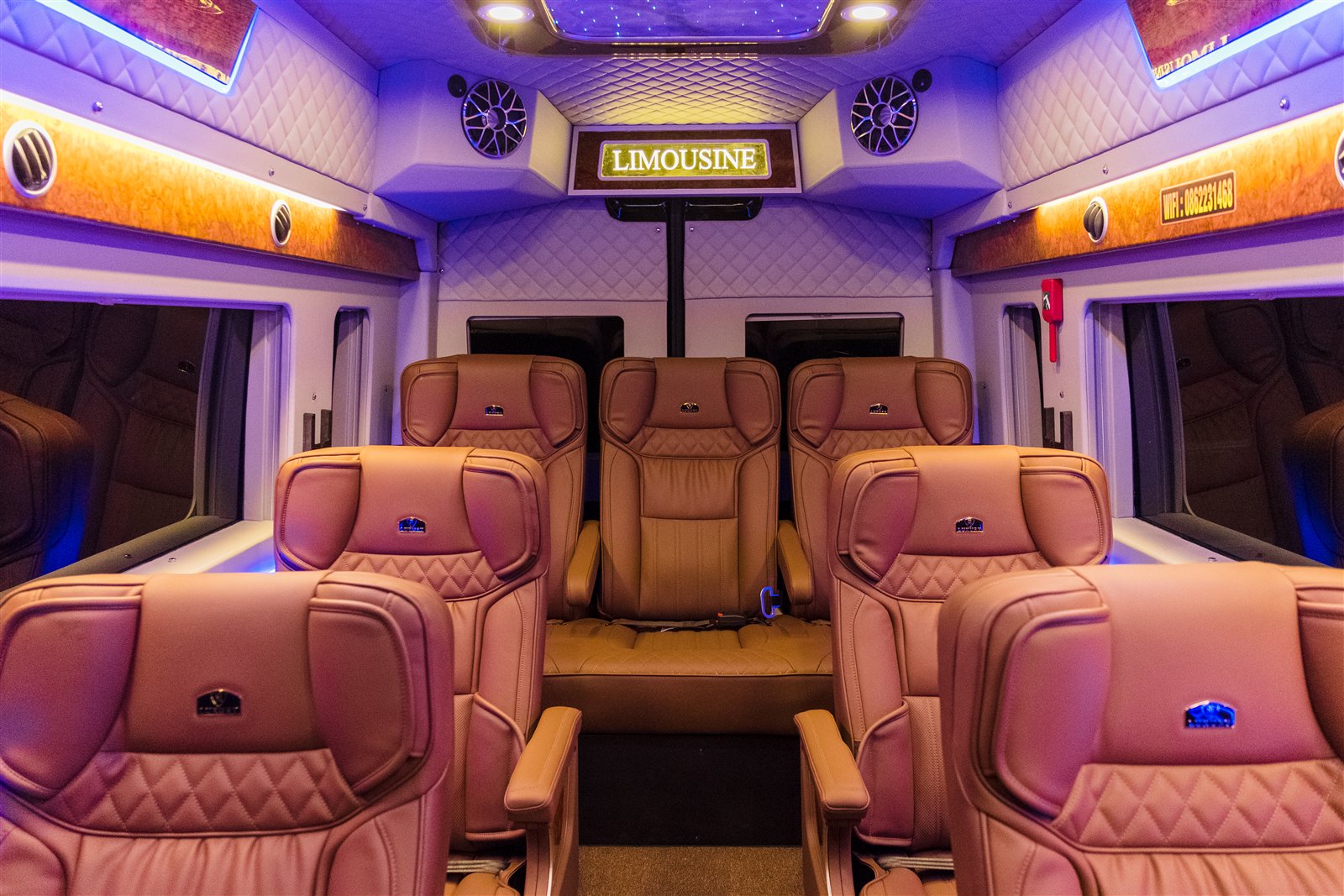 Leather reclining seats inside a premium limousine van